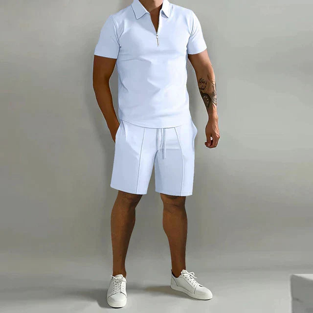 Smart summer outfit for men: breathable polo shirt and comfortable matching shorts. Ideal for sunny days.