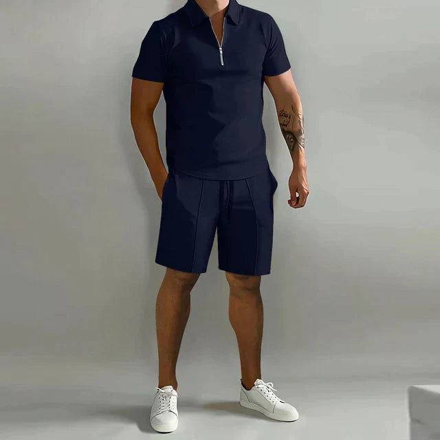Complete men's summer outfit set: elegant polo with zipper collar and coordinating shorts for easy styling.