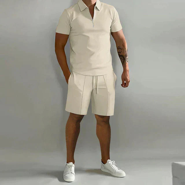Men's casual summer set: stylish polo shirt with a modern zipper collar and comfortable, matching shorts.