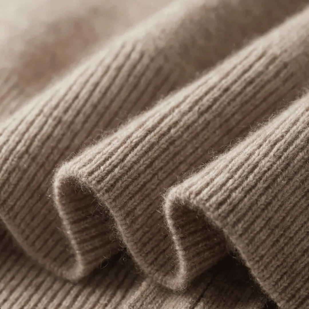 Relaxed fit men's zip-up knit cardigan, providing warmth and a sophisticated smart casual look.