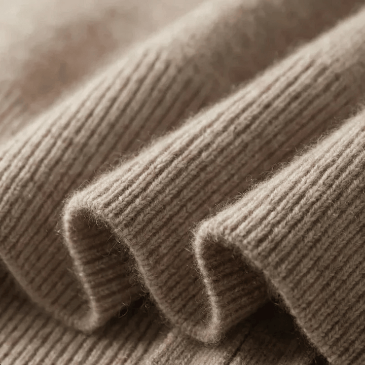 Relaxed fit men's zip-up knit cardigan, providing warmth and a sophisticated smart casual look.