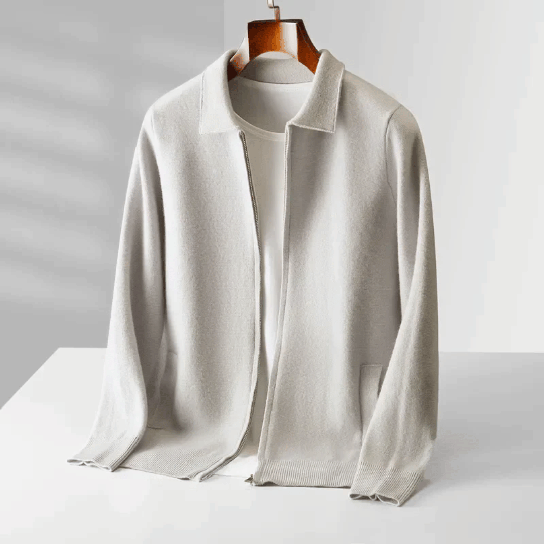 Detail of the high-quality knit fabric on a men's zip-up cardigan, suitable for smart casual wear.