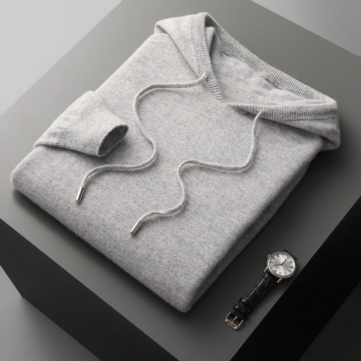 Soft men's apparel: a comfy hooded sweatshirt with long sleeves. Ideal for casual wear, fashion, and loungewear.