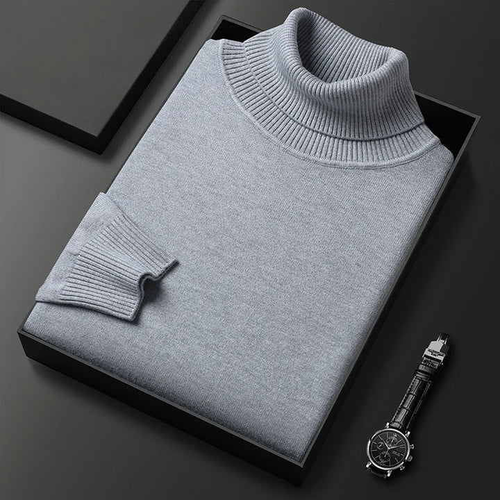 Black men's long sleeve turtleneck sweater, offering sophisticated comfort and classic fashion.