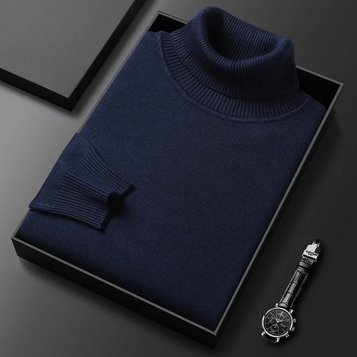 Navy men's comfortable turtleneck sweater, ideal for versatile and sophisticated style.