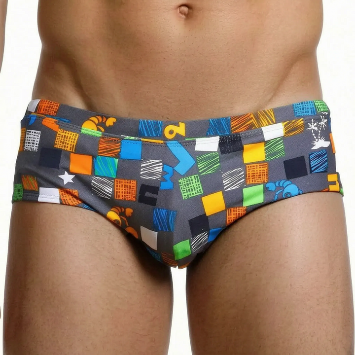 Comfortable men's low rise square cut swim trunks, offering a secure fit for active pool and beach days.
