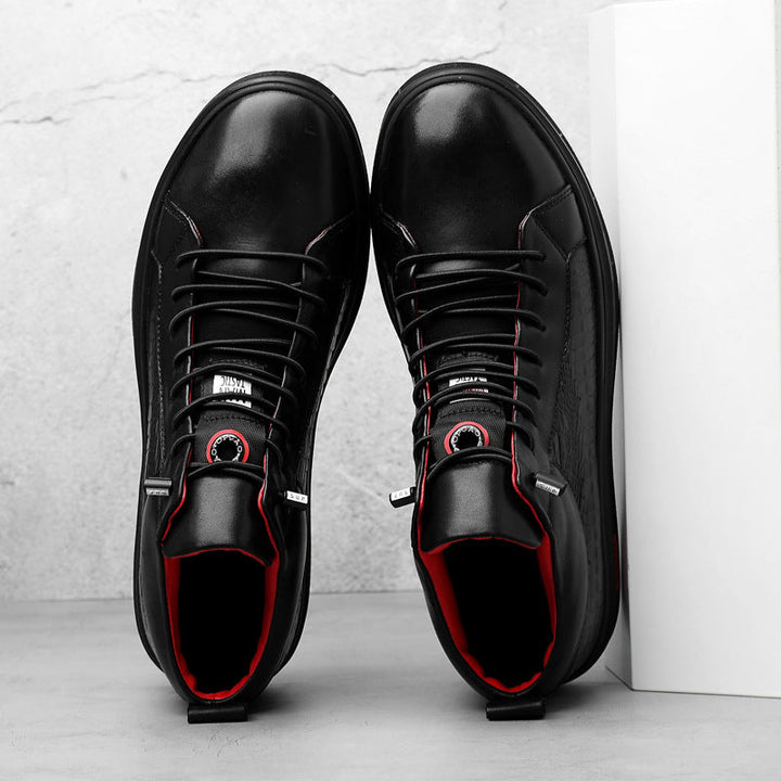 Comfortable men's high-top shoes with sleek black design & vibrant red details, essential for daily style.