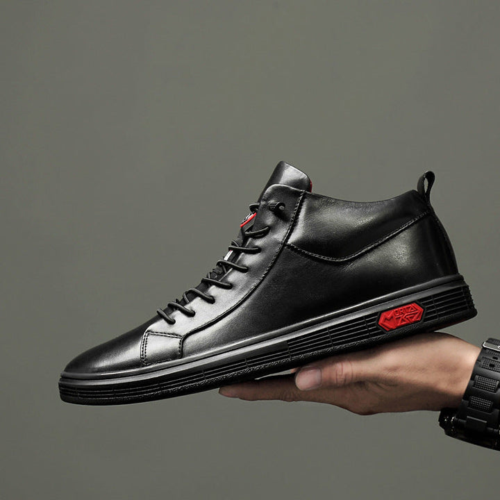 Stylish high-top athletic shoes for men, featuring a black base and dynamic red accent design.