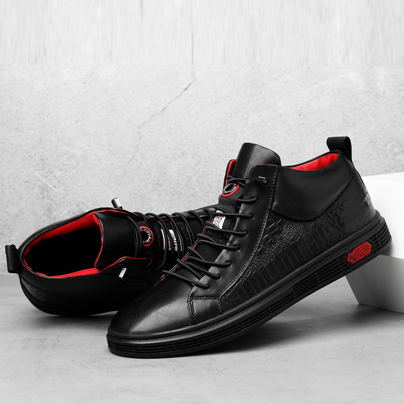 Close-up of men's high-top fashion sneakers, highlighting the striking red accents and quality material.