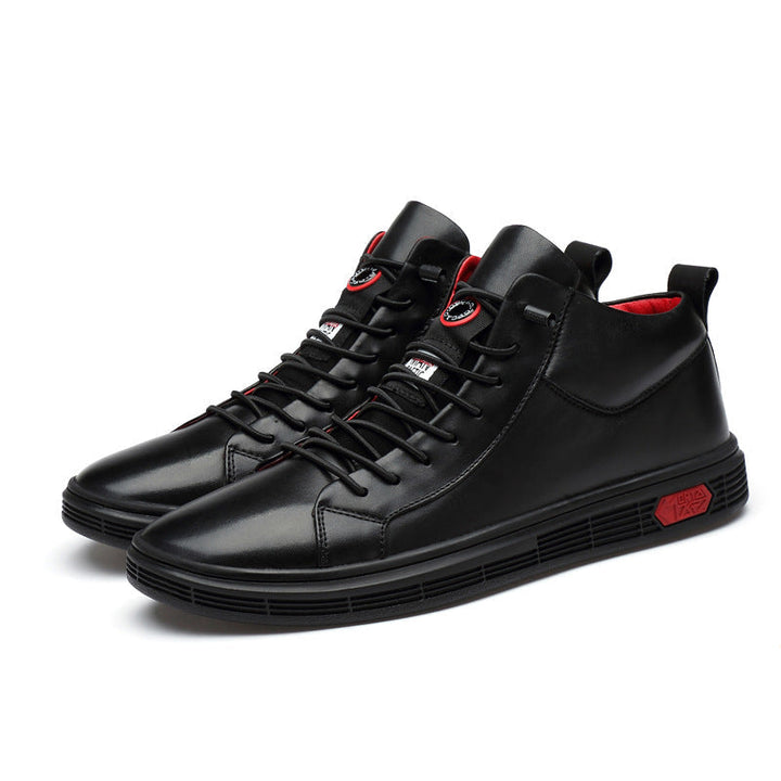 Streetwear-inspired men's high-top shoes, black with prominent red accents, showcasing modern style.