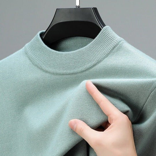 Comfortable men's pullover sweater with a stylish mock neck, essential for daily casual wear and layering.