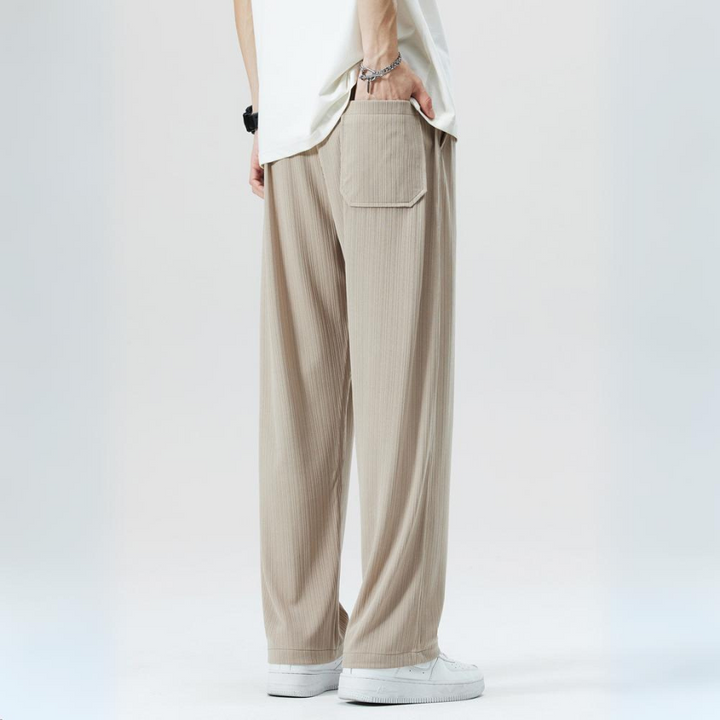 Khaki men's pleated trousers with elastic waist, offering comfort and a stylish business casual look.