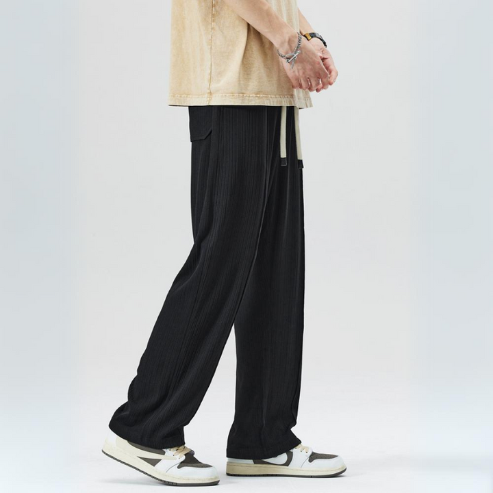 Men's comfortable pleated trousers in a stylish color, perfect for an elegant smart casual outfit.