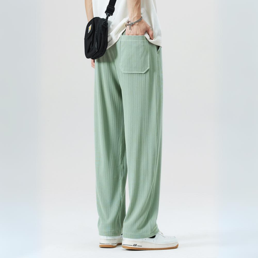Elegant men's pleated trousers, perfect for business casual or smart casual attire, combining style and comfort.