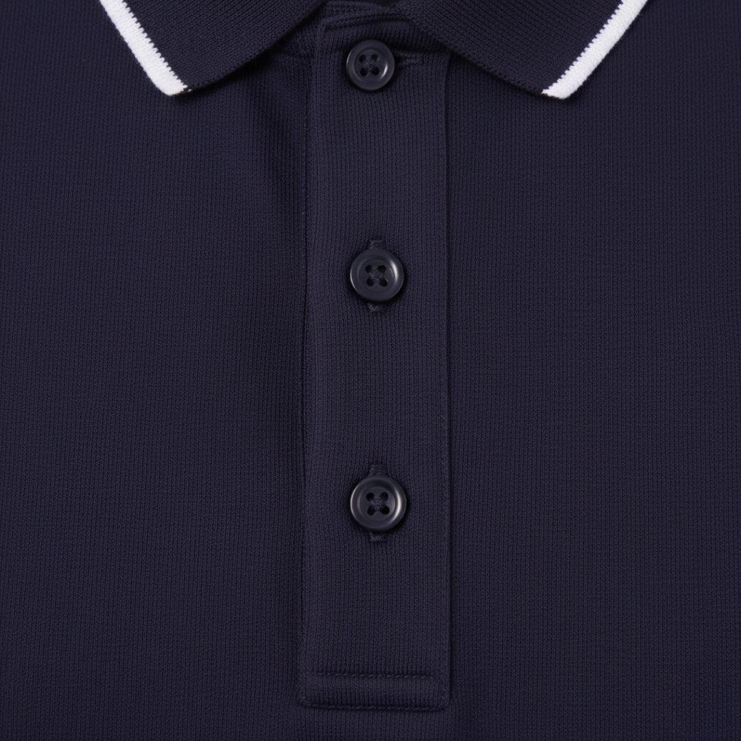 Tailored fit men's polo shirt, short sleeve, with a stylish tipped collar. Moisture-wicking & versatile.