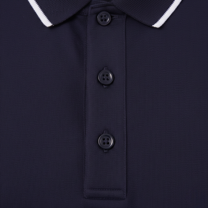 Tailored fit men's polo shirt, short sleeve, with a stylish tipped collar. Moisture-wicking & versatile.