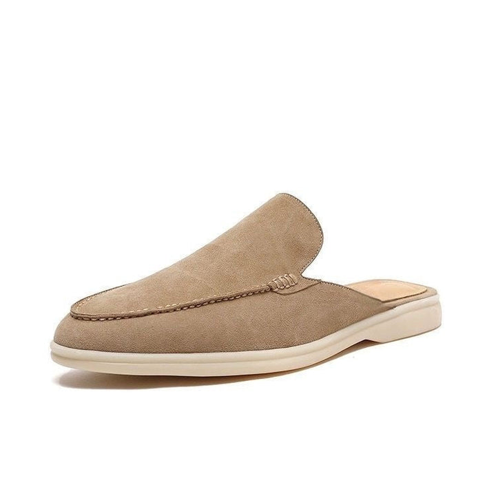 Modern men's slip-on backless loafers. Stylish, easy-to-wear casual shoes offering ultimate summer comfort.