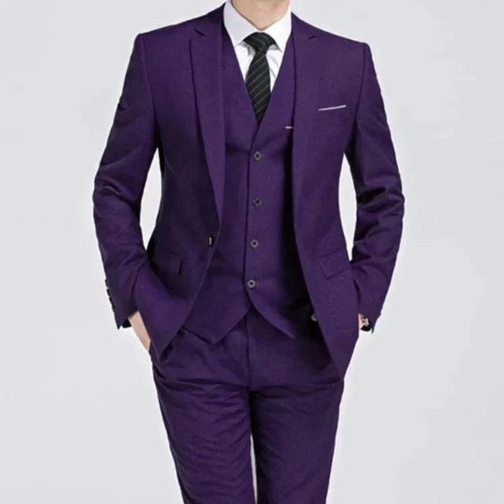 Men's stylish three-piece formal suit. Classic tailored business wear with single button jacket, vest & trousers.