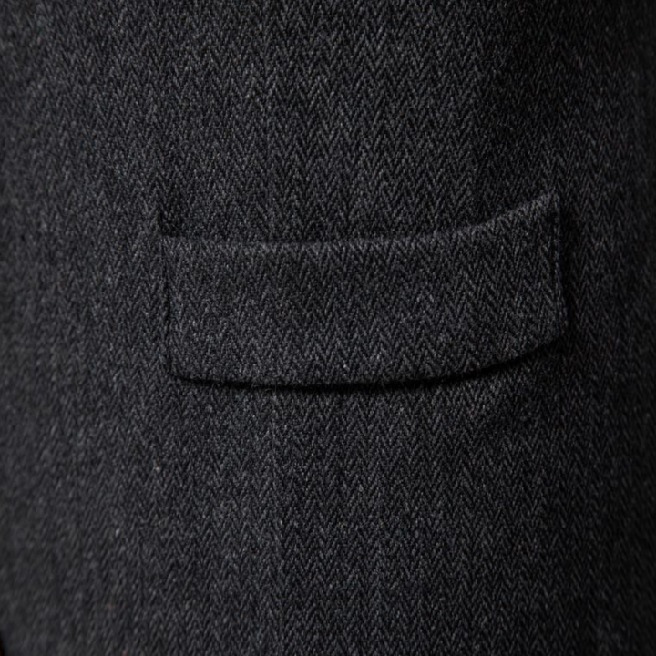Man wearing a stylish Victor wool blend vest, showcasing a sophisticated business casual layered look.