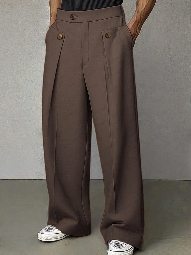 Close-up of men's wide-leg pleated trousers, highlighting quality fabric & comfortable, modern design.