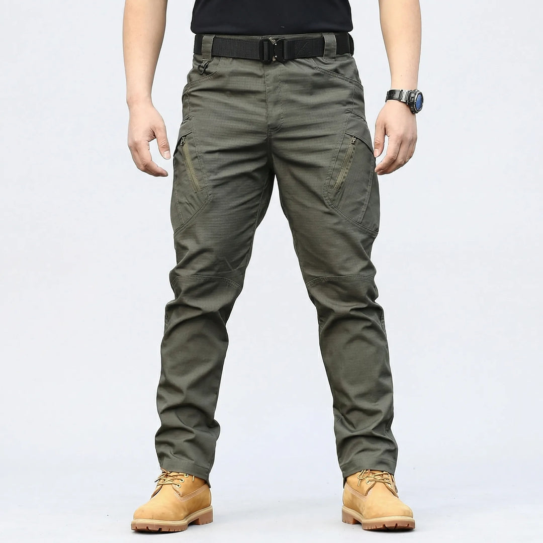 Multi-pocket men's tactical cargo pants with 9 utility pockets for hiking, work, and adventure.