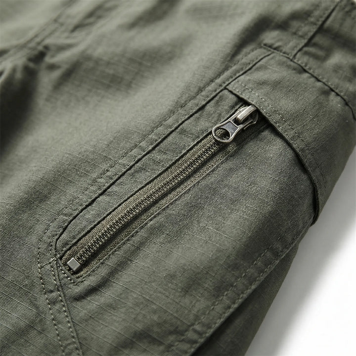 Durable men's tactical cargo pants, water-resistant & flexible, perfect for outdoor, hiking, and work.