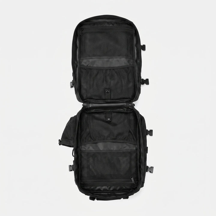Man wearing a durable tactical hiking pack, ready for outdoor adventures & long-distance travel.