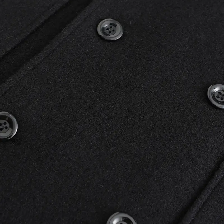 Tailored men's black double-breasted overcoat. Elegant long winter coat, perfect for business or formal events.