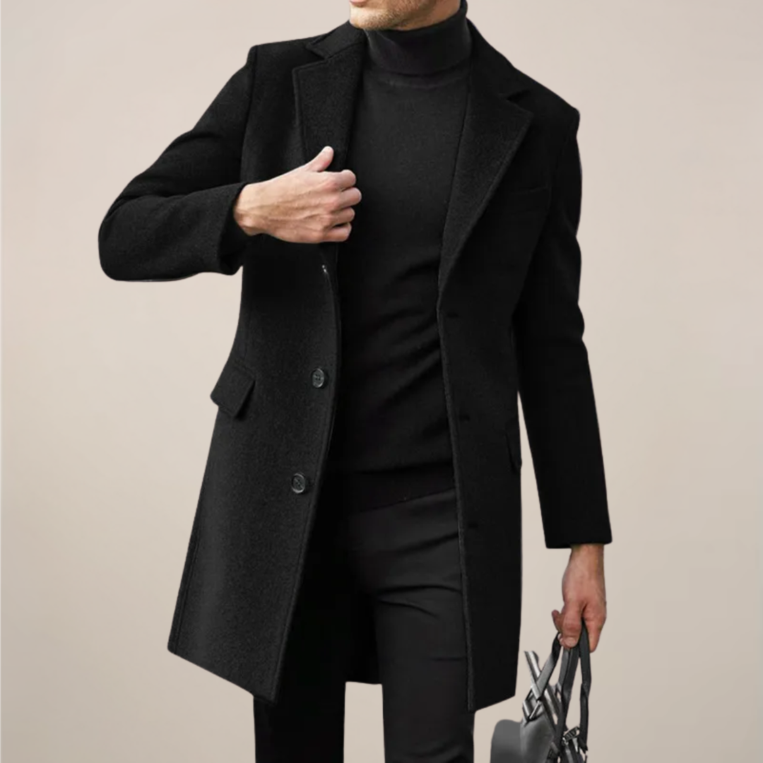 Men's tailored black long overcoat, single-breasted, for stylish winter fashion & formal cold weather wear.