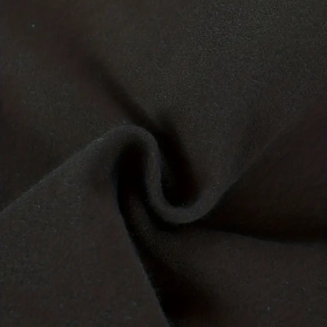 Elegant men's black tailored single-breasted overcoat, perfect for winter menswear and sharp style.