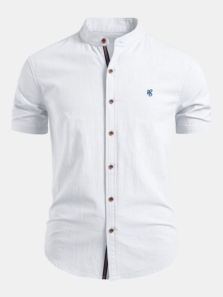 Elegant men's short sleeve mandarin collar shirt, tailored for a smart look, suitable for warm weather.