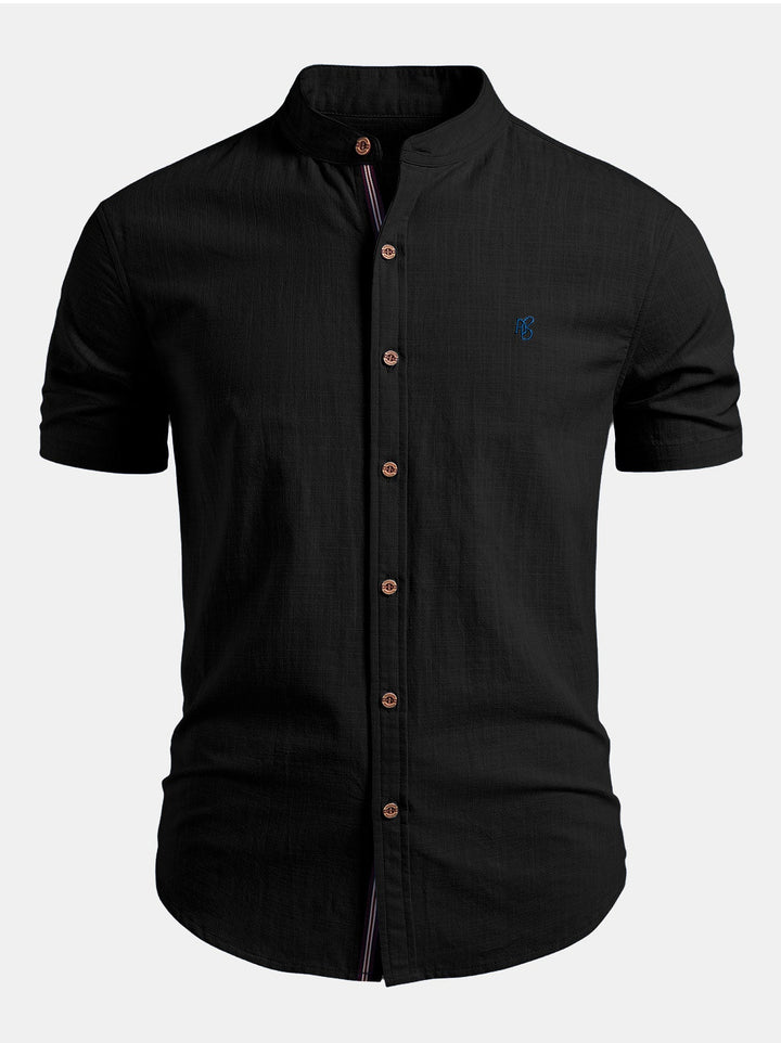 Fashionable men's tailored short sleeve shirt with a distinctive mandarin collar, ideal for casual elegance.