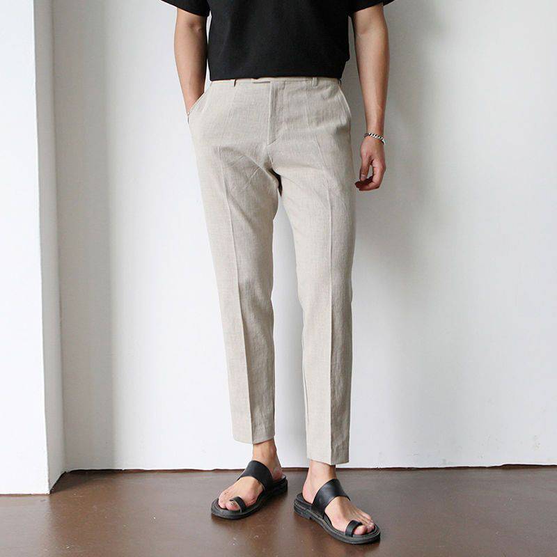 Beige tailored fit men's trousers, modern & breathable. Lightweight summer pants for versatile casual and smart casual outfits.