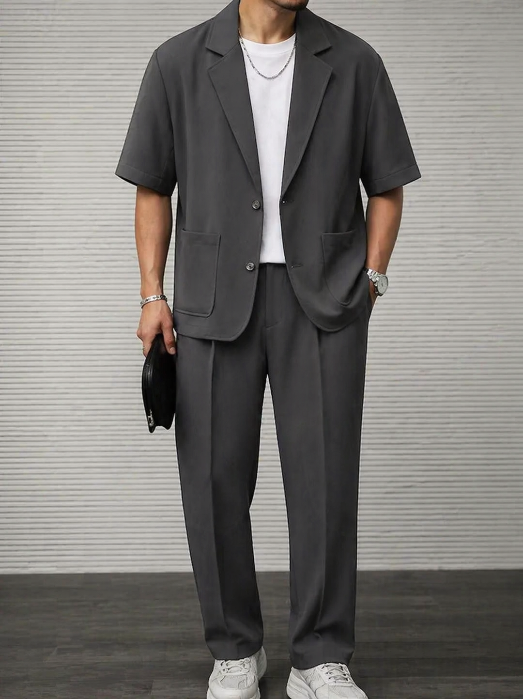 Khaki men's tailored short sleeve blazer and trousers co-ord set, perfect for a modern, smart casual outfit.
