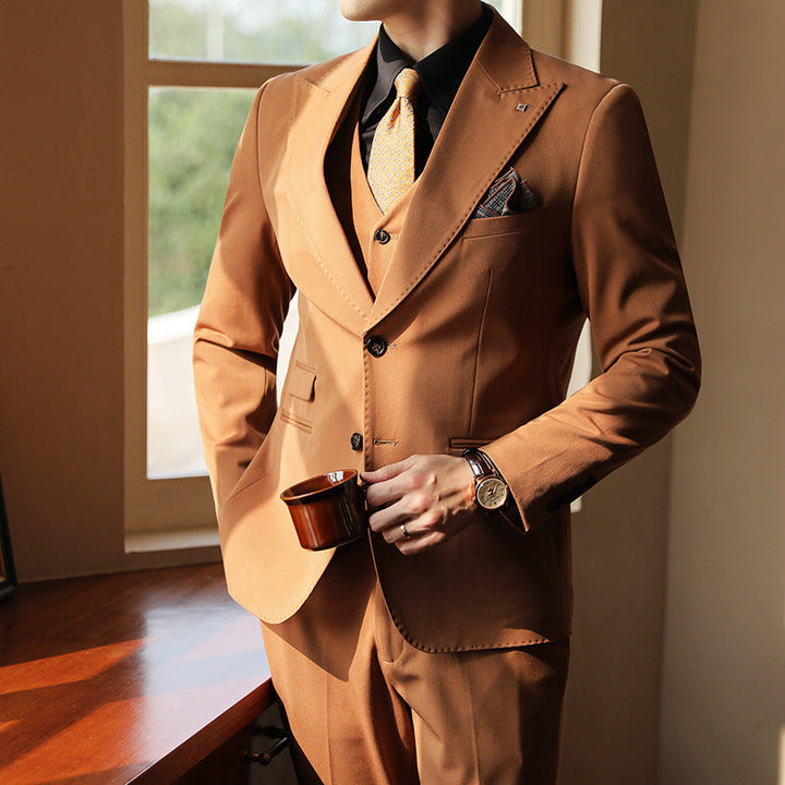 Men's tailored three-piece formal suit. Perfect for weddings & special events. Slim fit design.