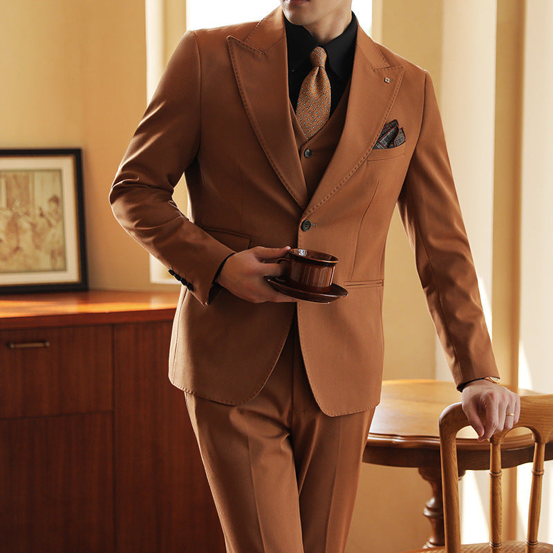 Classic black men's tailored three-piece suit. Ideal formal wear for weddings & business events.