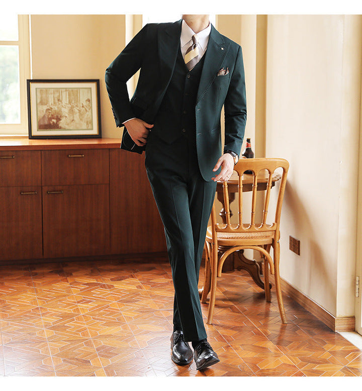 Modern green men's tailored three-piece suit. Perfect dress suit for weddings, parties & formal events.