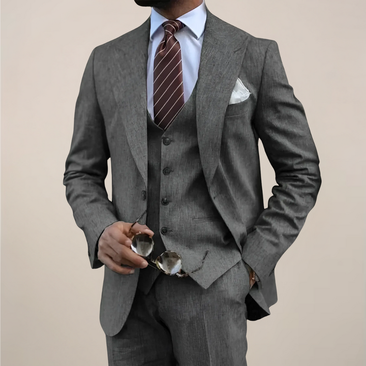 Professional men's tailored three-piece suit, ideal business attire for sophisticated formal events & office.