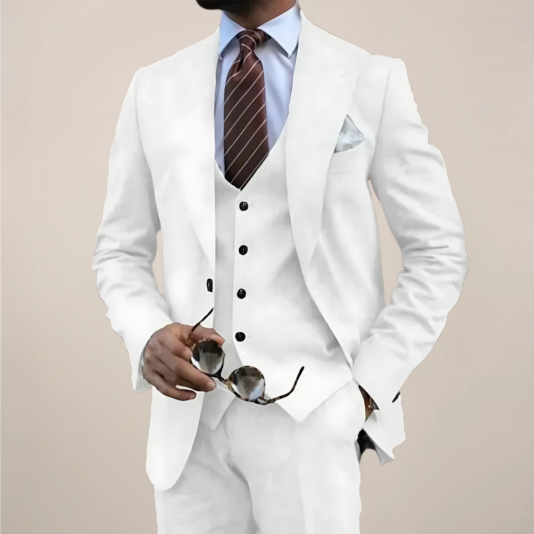 Elegant men's three-piece suit for special occasions. Tailored blazer, waistcoat, and trousers for formalwear.