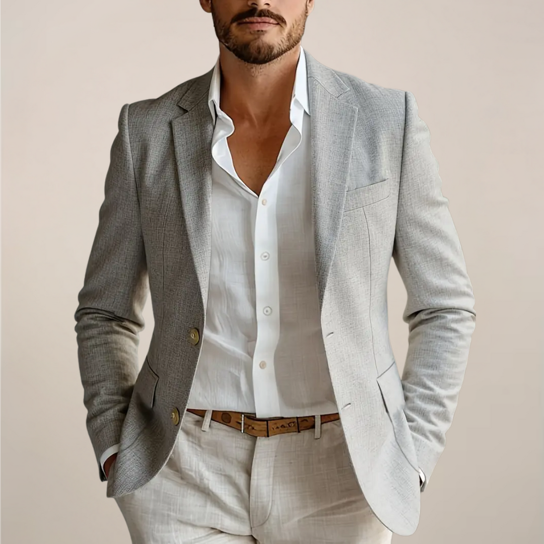 Elegant men's two-piece suit for wedding guests or formal events. Tailored fit ensures a sharp, modern silhouette.