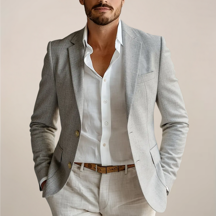 Elegant men's two-piece suit for wedding guests or formal events. Tailored fit ensures a sharp, modern silhouette.