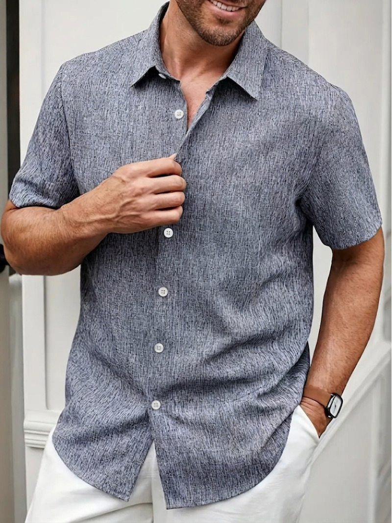 Versatile men's button-down textured polo shirt, regular fit, short sleeve, great for casual or smart-casual looks.