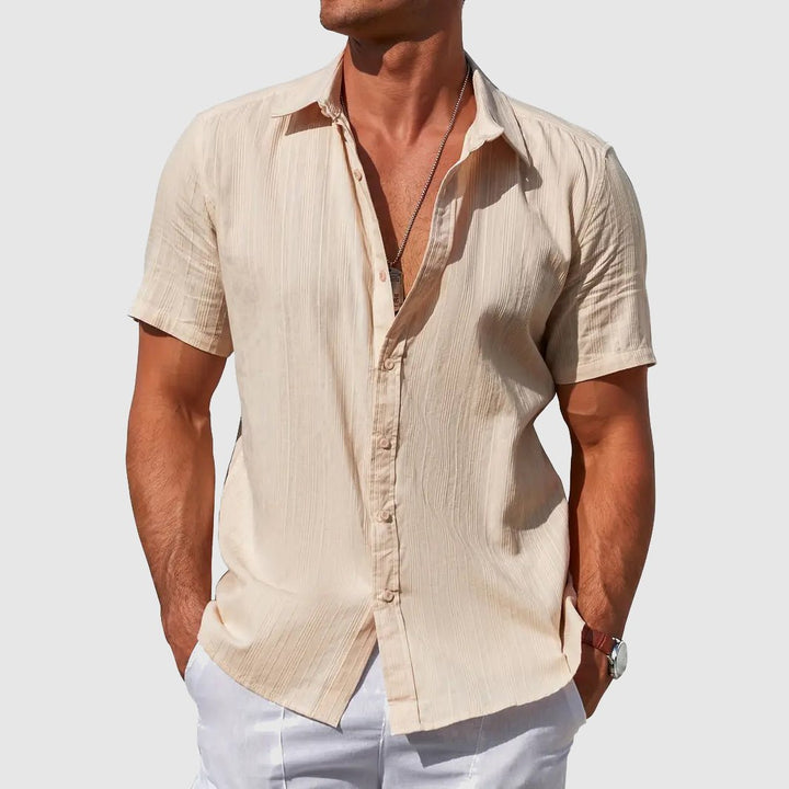 Lightweight textured men's short sleeve top with button front, perfect for summer casual.