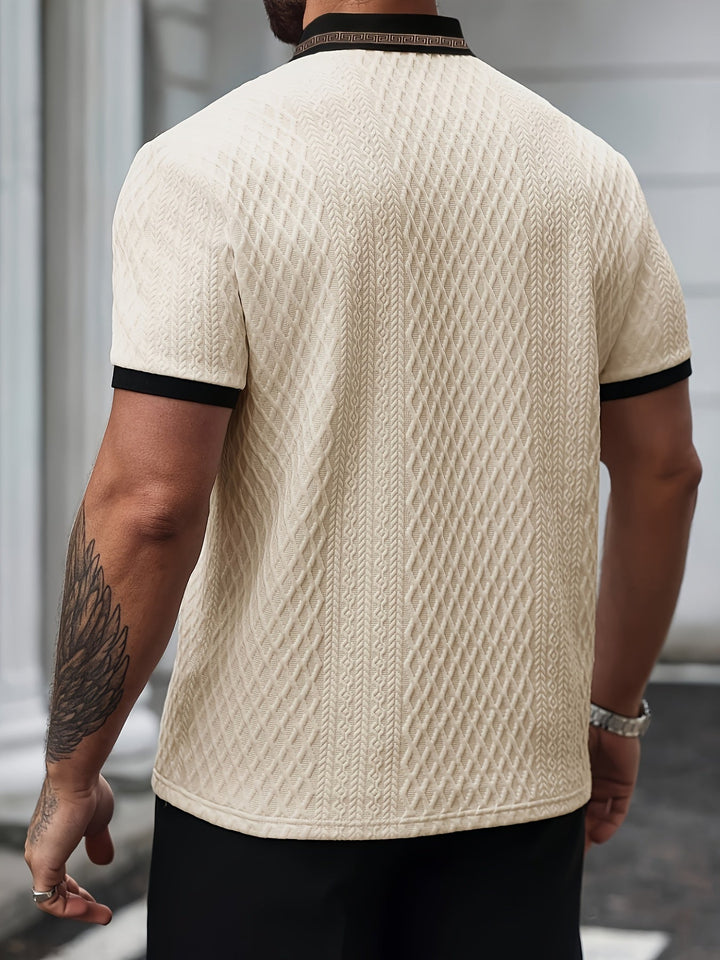 Close-up of men's slim fit polo featuring a distinctive textured fabric and short sleeves.
