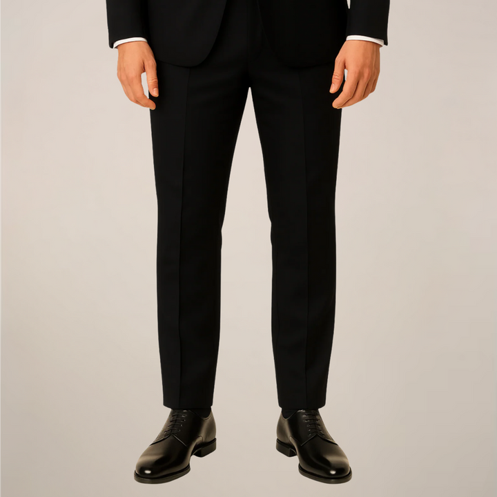 Tailored men's three-piece formal dinner suit, featuring stylish contrast lapels for weddings & special events.