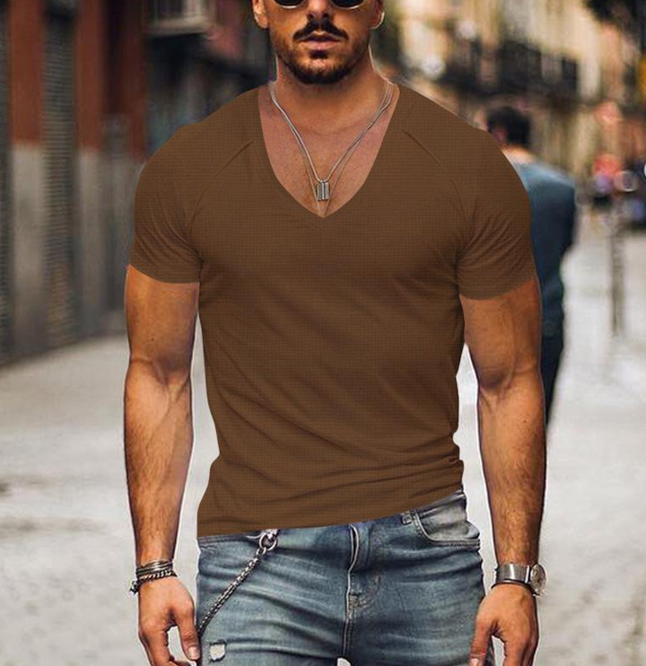 Man modeling a Men's Timo V-neck t-shirt, demonstrating the relaxed, regular fit & casual look.