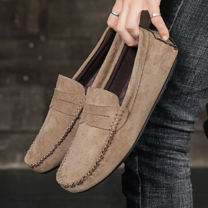 Sophisticated Men's Tivoli penny loafers, premium leather, comfortable slip-on men's footwear.