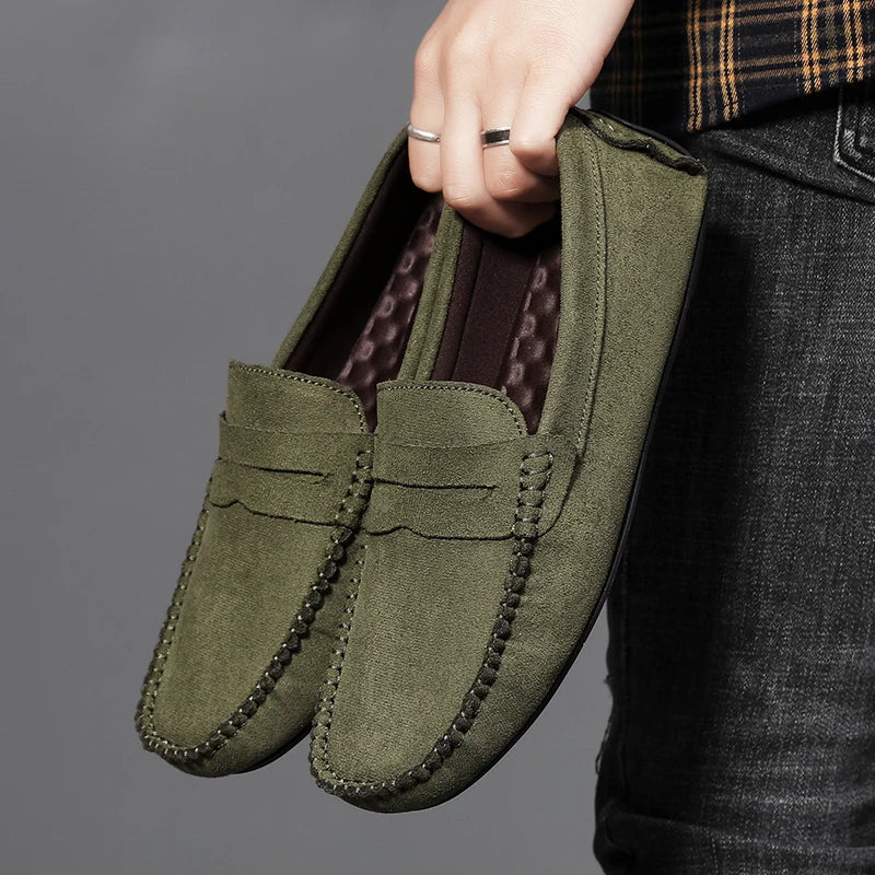 Man wearing classic Tivoli loafers, perfect for smart casual or professional men's dress shoes.