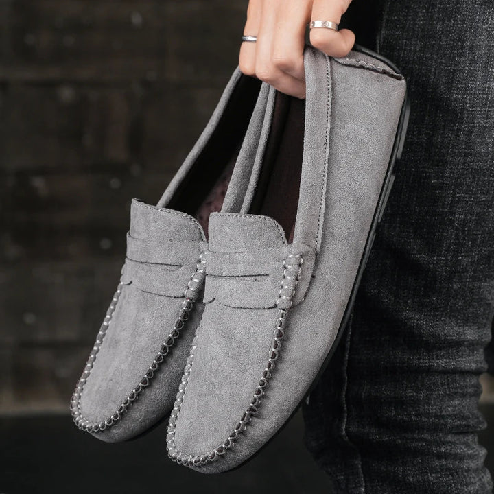 Elegant Men's Tivoli loafers with detailed stitching, comfortable and versatile slip-on men's footwear.