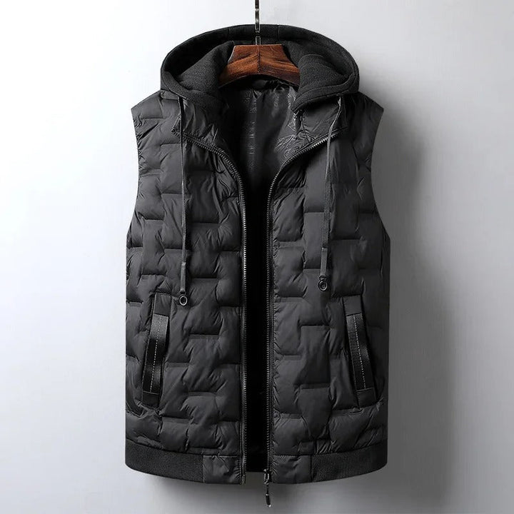 Black men's Trailblazer outdoor vest with a removable hood. Perfect cold weather activewear.